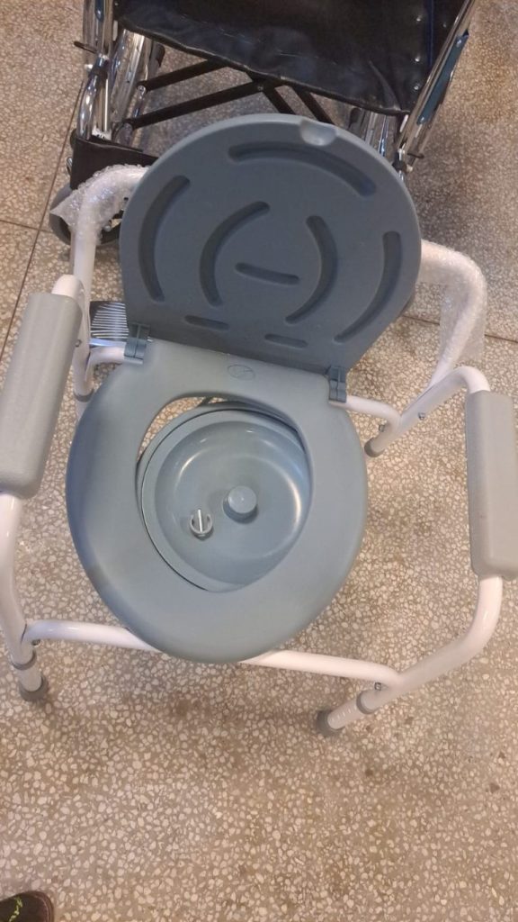 an image of a commode chair as a bedside toilet
